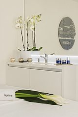 Fresh flowers and La Prairie products.