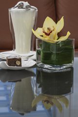 A warming hot chocolate served with a chocolate brownie