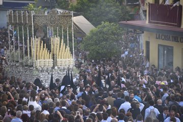 Processions passing through Seville during Semana Santa.