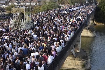 The crowded Puente de Triana in Seville - a spectacular sight.