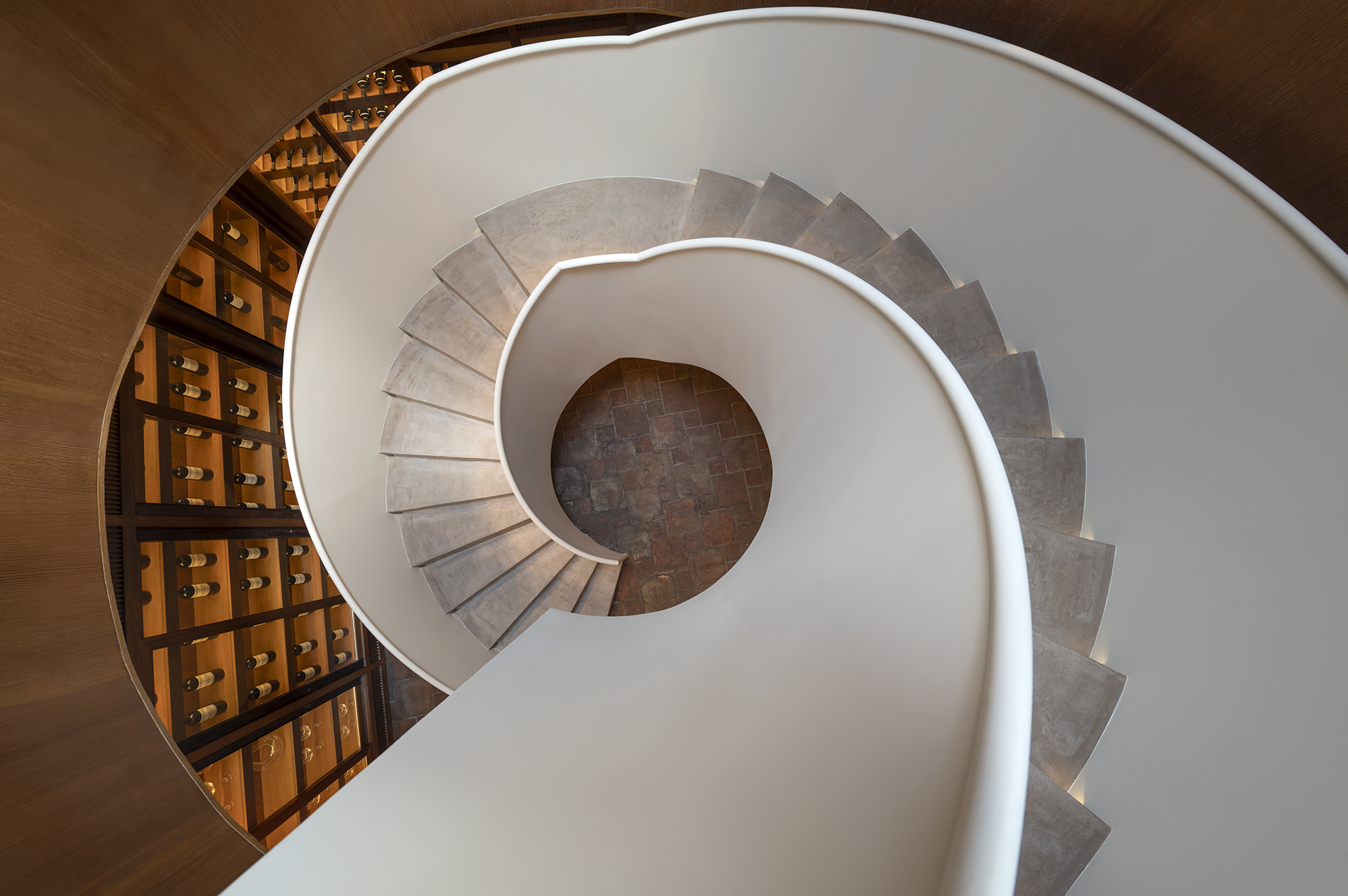 An exquisite bodega with a contemporary spiral staircase 